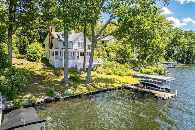 424 E Wakefield Blvd, Winchester, CT 06098 - dock with a water view, view of scattered trees, and a lawn