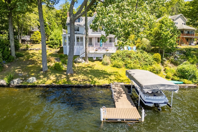 424 E Wakefield Blvd, Winchester, CT 06098 - dock area with a water view, view of scattered trees, a yard, and boat lift