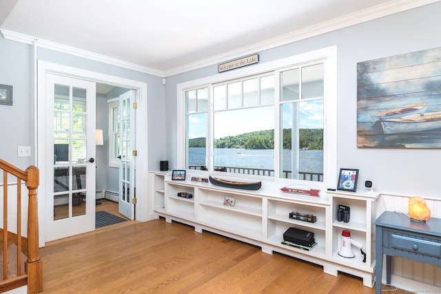 424 E Wakefield Blvd, Winchester, CT 06098 - sitting room featuring ornamental molding, wood finished floors, baseboard heating, and stairway