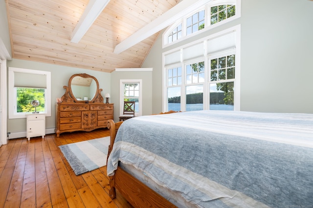 424 E Wakefield Blvd, Winchester, CT 06098 - bedroom with wood-type flooring, baseboard heating, wood ceiling with exposed beams, high vaulted ceiling, and a water view
