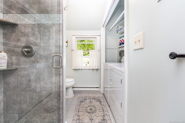 424 E Wakefield Blvd, Winchester, CT 06098 - bathroom with a baseboard radiator, washing machine and dryer, a stall shower, tile patterned floors, and toilet