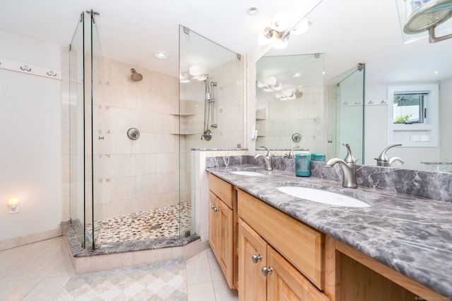 424 E Wakefield Blvd, Winchester, CT 06098 - bathroom with a shower stall, double vanity, and tile patterned floors