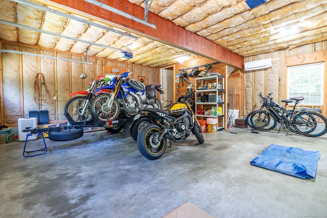 424 E Wakefield Blvd, Winchester, CT 06098 - garage featuring a garage door opener and an AC wall unit