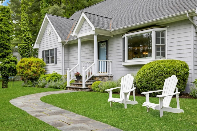 6 Queens Ln, Darien, CT 06820 - view of front of home with a shingled roof and a front yard