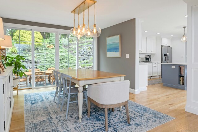 6 Queens Ln, Darien, CT 06820 - dining room featuring light wood-style flooring, a chandelier, recessed lighting, and baseboards