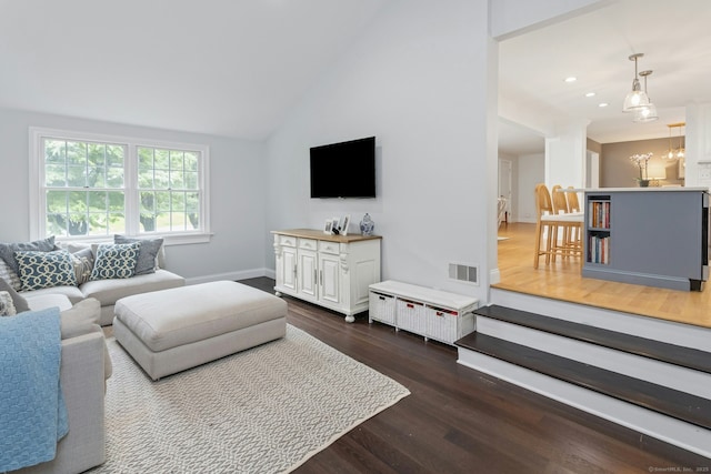 6 Queens Ln, Darien, CT 06820 - living area featuring wood finished floors, a chandelier, recessed lighting, baseboards, and high vaulted ceiling