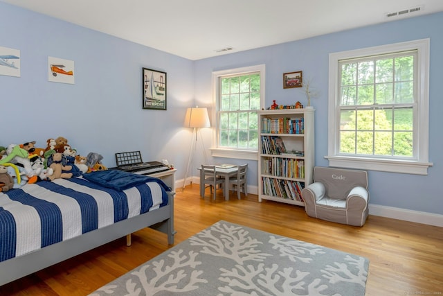 6 Queens Ln, Darien, CT 06820 - bedroom featuring wood finished floors and baseboards