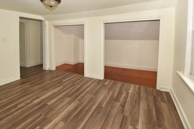 17 Spruce St, Vernon, CT 06066 - unfurnished bedroom featuring dark wood finished floors, multiple closets, and baseboards