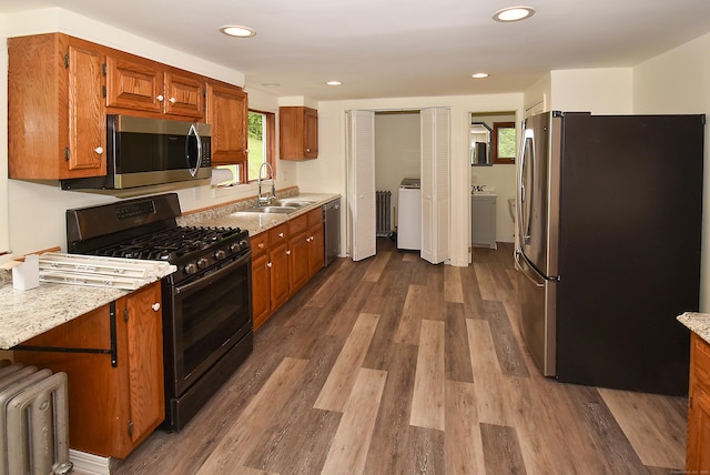 17 Spruce St, Vernon, CT 06066 - kitchen with stainless steel appliances, a sink, plenty of natural light, dark wood-style floors, and recessed lighting