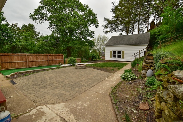 17 Spruce St, Vernon, CT 06066 - view of patio / terrace with a fire pit and an outdoor structure