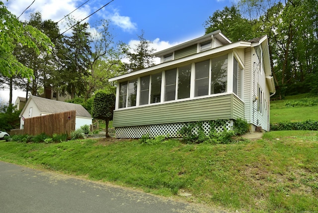 17 Spruce St, Vernon, CT 06066 - view of side of property with a sunroom
