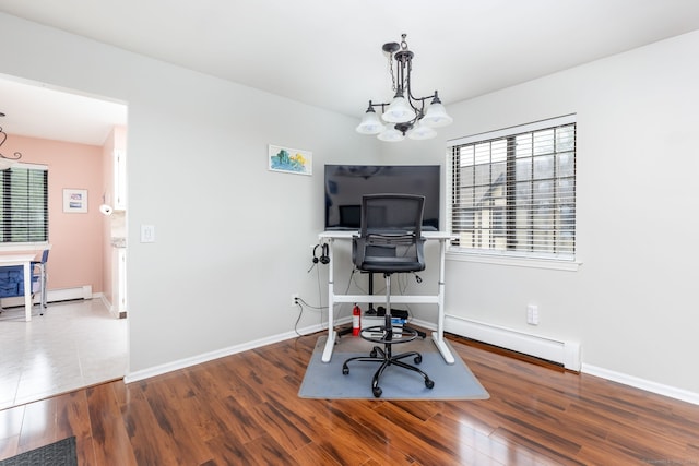 202 Foxwood Ln Unit 202, Milford, CT 06461 - home office with a baseboard heating unit, a chandelier, wood finished floors, and baseboards