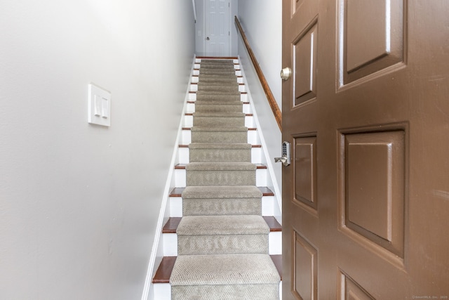 202 Foxwood Ln Unit 202, Milford, CT 06461 - stairway featuring baseboards