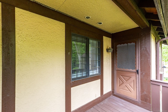 202 Foxwood Ln Unit 202, Milford, CT 06461 - doorway to property with stucco siding