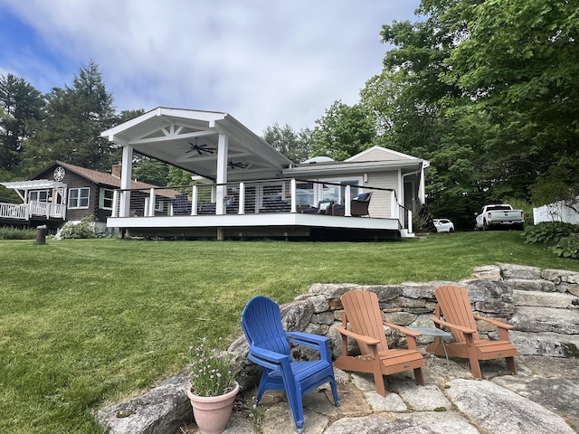72 Lake View Dr, Woodstock, CT 06281 - rear view of house with a deck, ceiling fan, and a yard