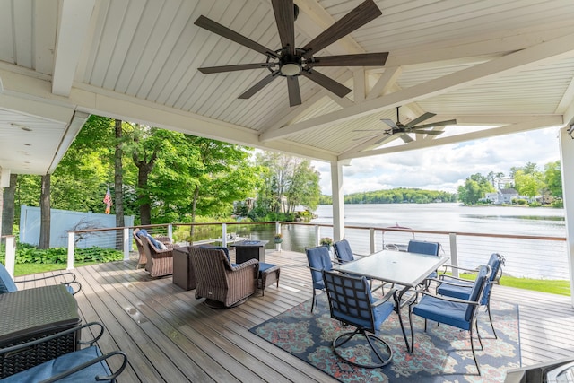 72 Lake View Dr, Woodstock, CT 06281 - wooden terrace with outdoor dining area, a water view, and a ceiling fan