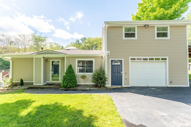 72 Lake View Dr, Woodstock, CT 06281 - traditional-style home with a front lawn, driveway, and an attached garage