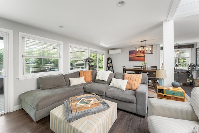 72 Lake View Dr, Woodstock, CT 06281 - living area with a chandelier, dark wood finished floors, a wall mounted air conditioner, baseboards, and recessed lighting