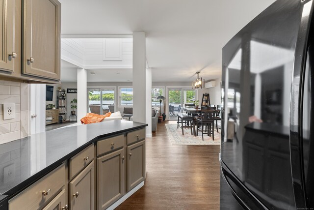 72 Lake View Dr, Woodstock, CT 06281 - kitchen with freestanding refrigerator, gray cabinets, dark wood-style floors, a peninsula, and open floor plan