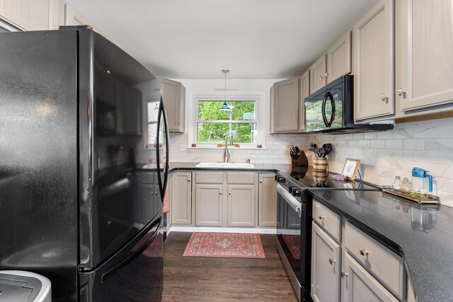 72 Lake View Dr, Woodstock, CT 06281 - kitchen with black appliances, a sink, dark wood finished floors, and backsplash