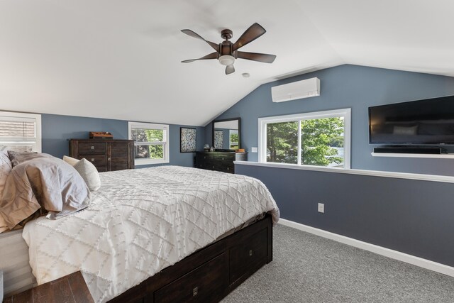 72 Lake View Dr, Woodstock, CT 06281 - bedroom featuring a wall unit AC, carpet, lofted ceiling, baseboards, and ceiling fan