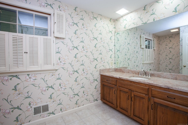 41 Blue Ridge Dr, Simsbury, CT 06089 - bathroom featuring wallpapered walls, vanity, and tile patterned flooring