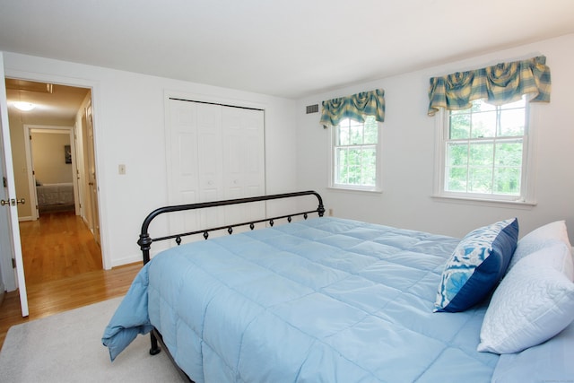41 Blue Ridge Dr, Simsbury, CT 06089 - bedroom featuring wood finished floors and a closet