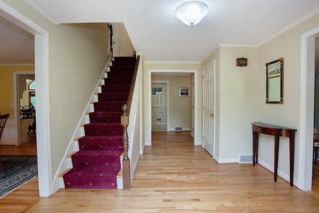 41 Blue Ridge Dr, Simsbury, CT 06089 - stairs with wood finished floors and ornamental molding