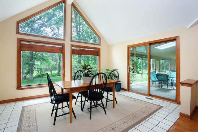 41 Blue Ridge Dr, Simsbury, CT 06089 - dining area with high vaulted ceiling and light tile patterned flooring