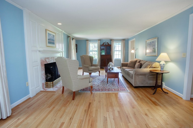 41 Blue Ridge Dr, Simsbury, CT 06089 - living area featuring wood finished floors, ornamental molding, and a high end fireplace