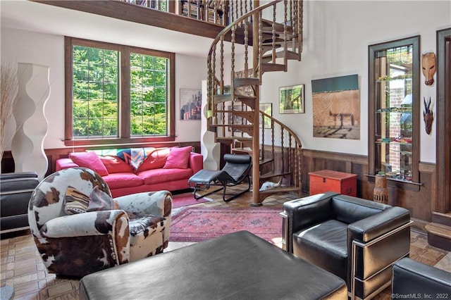 15 Tunxis Trl, Redding, CT 06896 - living room featuring stairway and a wainscoted wall