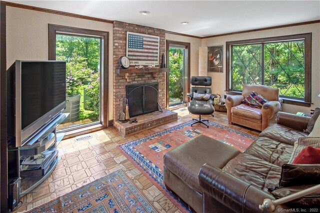15 Tunxis Trl, Redding, CT 06896 - living area with a brick fireplace and ornamental molding