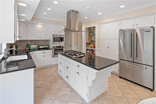 15 Tunxis Trl, Redding, CT 06896 - kitchen featuring appliances with stainless steel finishes, island range hood, light tile patterned flooring, a sink, and ornamental molding