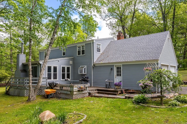 15 Woodcliff Dr, Simsbury, CT 06070 - back of property featuring a chimney, a shingled roof, a lawn, and a wooden deck