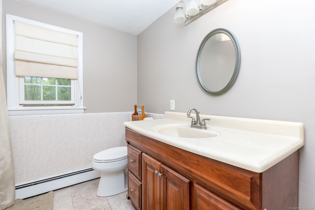 15 Woodcliff Dr, Simsbury, CT 06070 - bathroom featuring a baseboard heating unit, vanity, toilet, tile walls, and wainscoting
