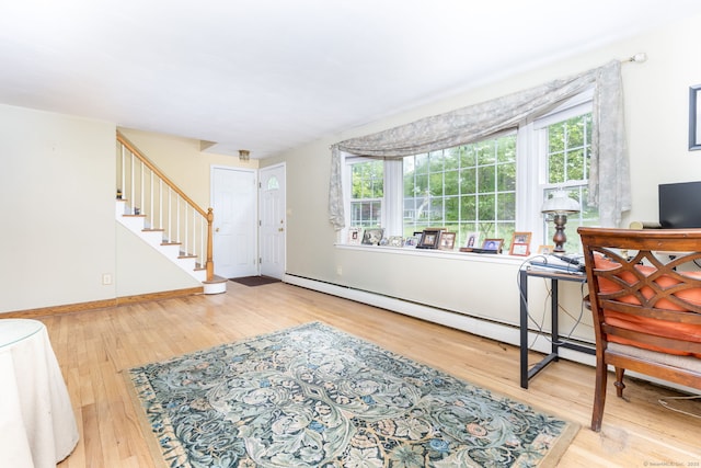 15 Woodcliff Dr, Simsbury, CT 06070 - foyer with plenty of natural light, wood finished floors, stairs, and baseboards