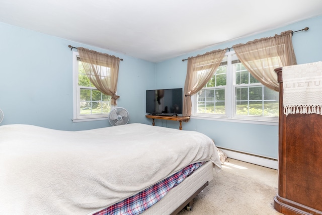15 Woodcliff Dr, Simsbury, CT 06070 - bedroom with a baseboard heating unit, multiple windows, and carpet floors
