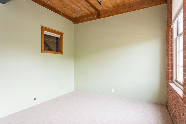 92 Main St Unit 214, Deep River, CT 06417 - unfurnished room featuring wooden ceiling with exposed beams, carpet floors, and plenty of natural light