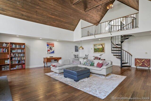 212 Fence Row Dr, Fairfield, CT 06824 - living area with high vaulted ceiling, stairway, baseboards, hardwood / wood-style floors, and wooden ceiling