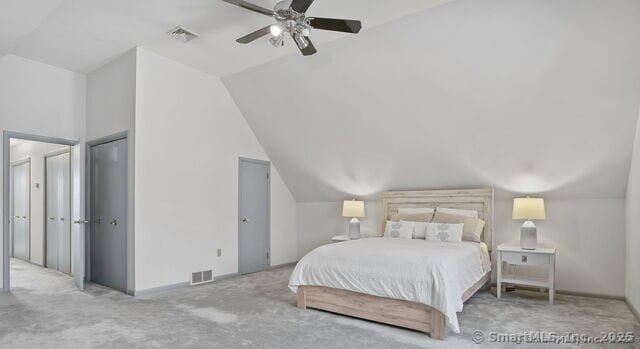 212 Fence Row Dr, Fairfield, CT 06824 - carpeted bedroom with vaulted ceiling and ceiling fan
