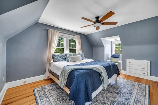 70 Mercer St, Stratford, CT 06614 - bedroom featuring vaulted ceiling, multiple windows, wood finished floors, baseboards, and a ceiling fan