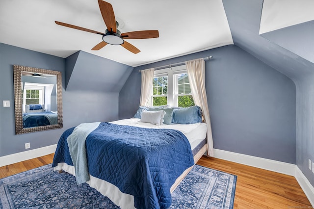 70 Mercer St, Stratford, CT 06614 - bedroom with lofted ceiling, wood finished floors, baseboards, and a ceiling fan