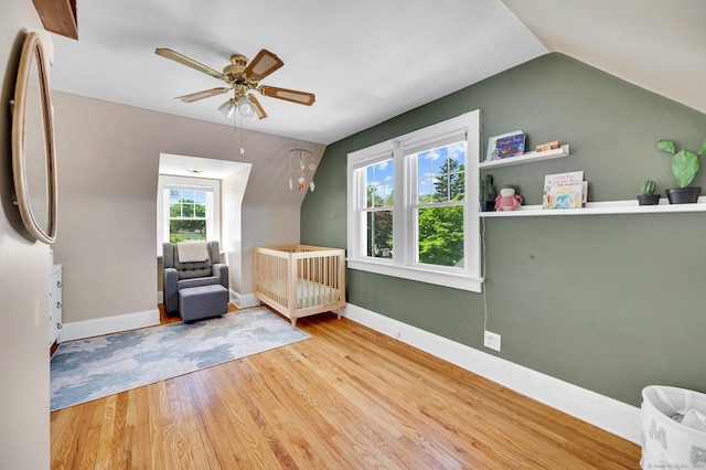 70 Mercer St, Stratford, CT 06614 - bedroom with wood finished floors, baseboards, lofted ceiling, and ceiling fan