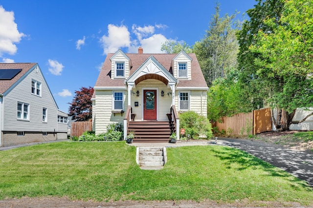 70 Mercer St, Stratford, CT 06614 - view of front of property featuring a chimney and a shingled roof