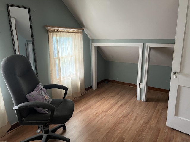40 Bellevue Rd, New Haven, CT 06511 - living area featuring vaulted ceiling, light wood-style floors, baseboards, and an office area