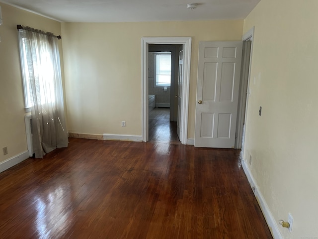 40 Bellevue Rd, New Haven, CT 06511 - empty room with wood finished floors and baseboards
