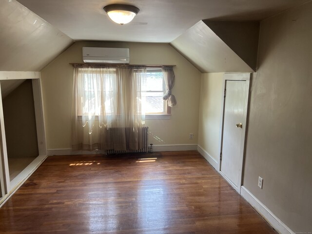 40 Bellevue Rd, New Haven, CT 06511 - bonus room with a wall mounted AC, wood finished floors, lofted ceiling, and baseboards