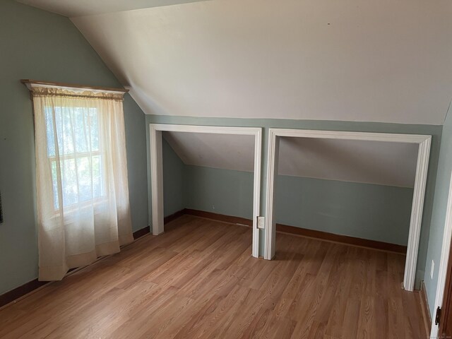 40 Bellevue Rd, New Haven, CT 06511 - additional living space featuring lofted ceiling, light wood-type flooring, and baseboards