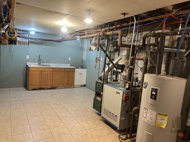 40 Bellevue Rd, New Haven, CT 06511 - unfinished below grade area featuring electric water heater and a sink