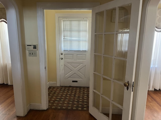 40 Bellevue Rd, New Haven, CT 06511 - entryway with arched walkways, wood finished floors, and baseboards